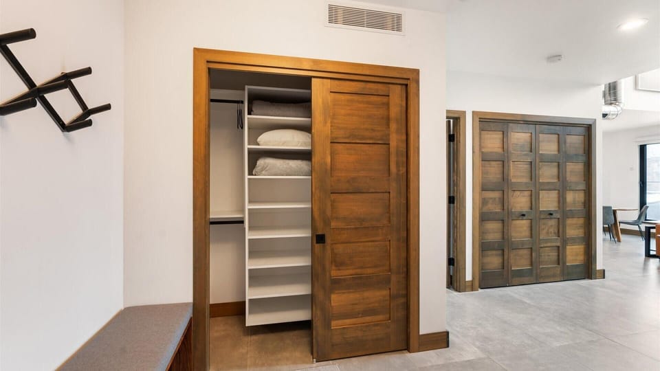 Large storage closet spacious enough for all of your summer or winter gear.