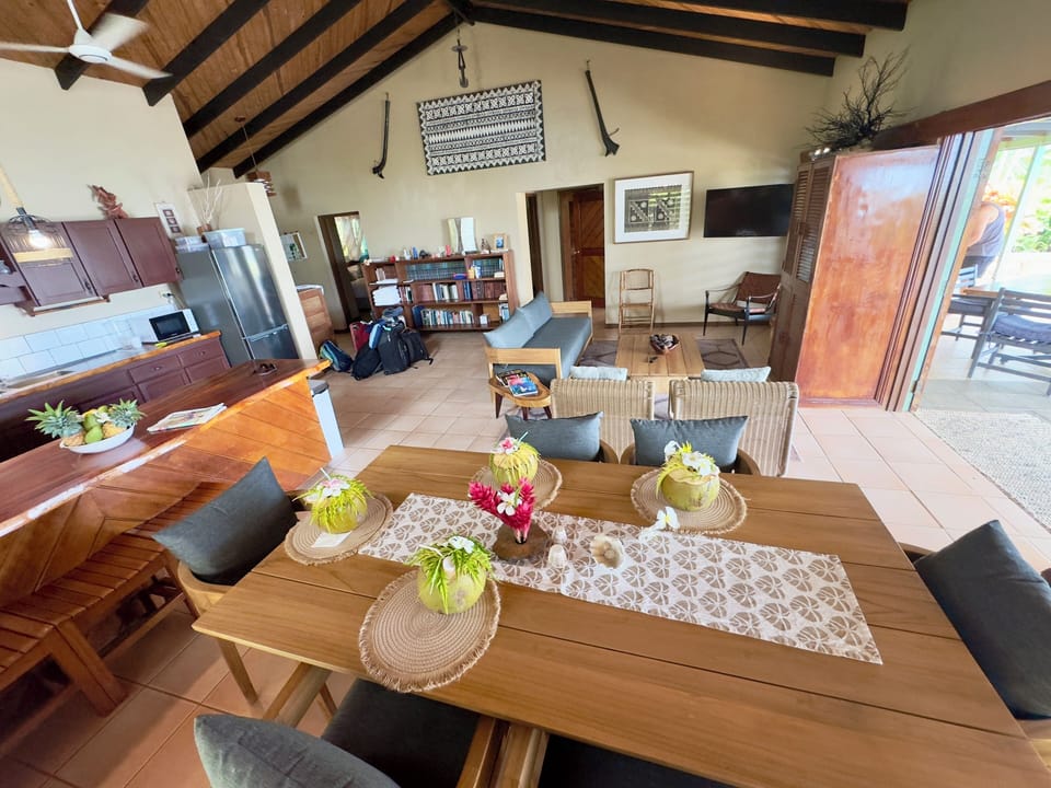 dinning table and view of living room.
Open Kitchen, Dining and Living area.