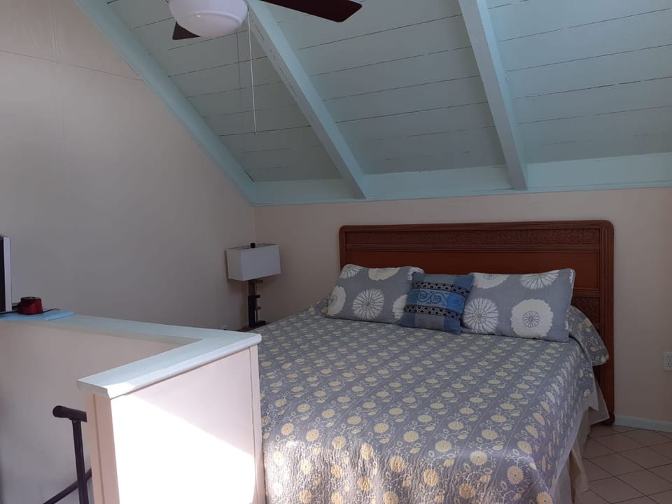 loft bedroom with king size bed