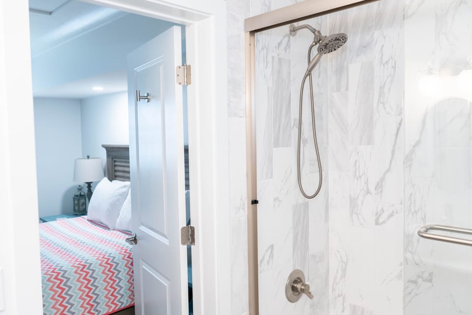 Full ensuite bath with shower/tub combo off second King bedroom