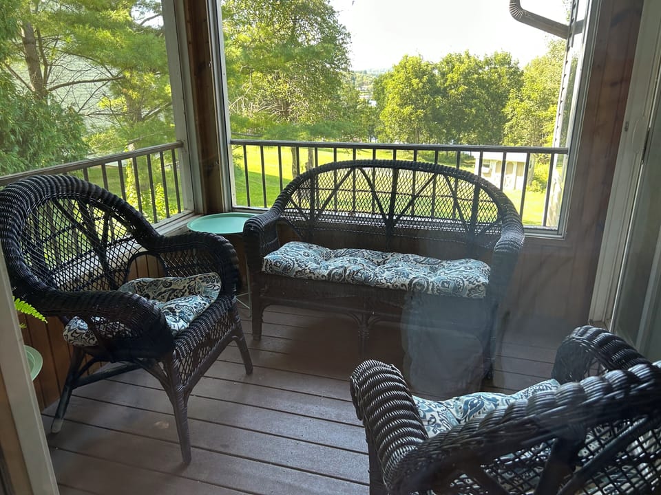 Screened in porch off kitchen for that morning cup of coffee