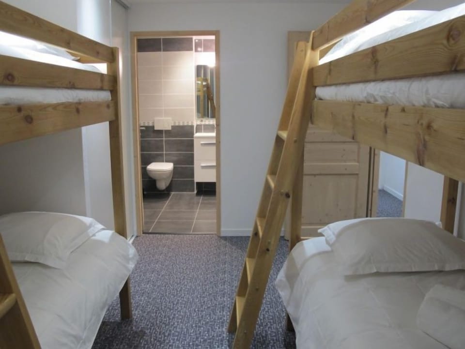Fall asleep in a bunk bed after a wonderful day outside. Please note photos are representative and actual unit may differ.