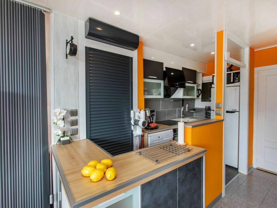Property, Cabinetry, Countertop, Building, Orange, Tableware, Wood, Interior Design, Kitchen