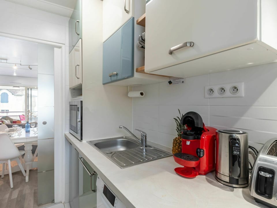 Cabinetry, Kitchen Sink, Tap, Countertop, Sink, Kitchen Appliance, Kitchen, Plumbing Fixture, Kitchen Stove, Home Appliance