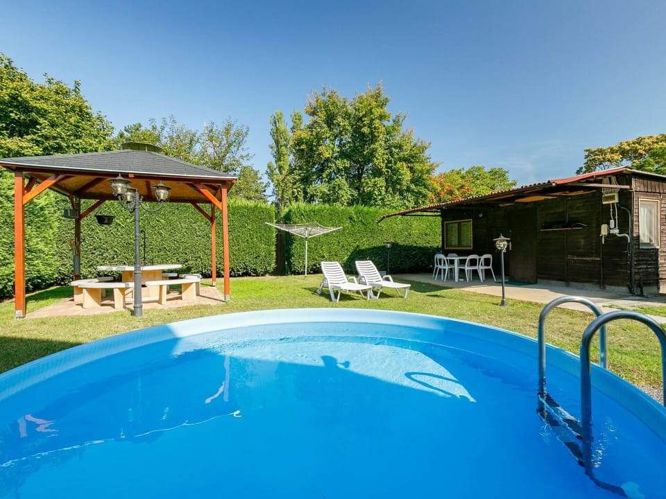 Water, Sky, Plant, Property, Building, Swimming Pool, Azure, Shade, Tree, Architecture