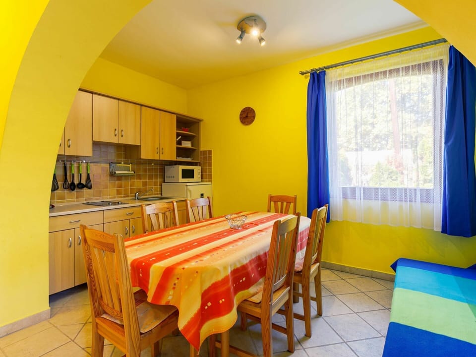 Table, Furniture, Property, Blue, Chair, Window, Wood, Interior Design, Yellow, Architecture