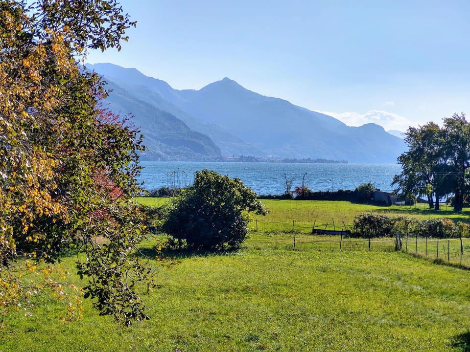 Sky, Plant, Water, Mountain, Cloud, Natural Landscape, Tree, Highland, Grass, Land Lot