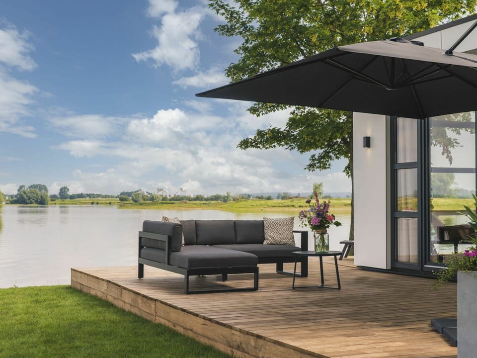 Water, Plant, Property, Sky, Cloud, Couch, Tree, Shade, Outdoor Furniture, Building