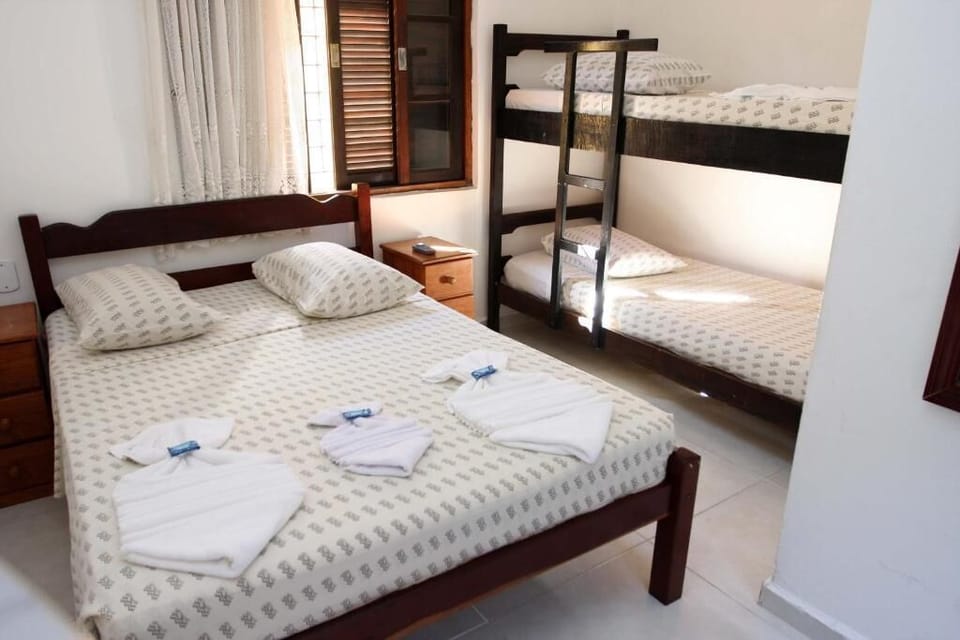 Family Room | 1 bedroom, minibar, bed sheets