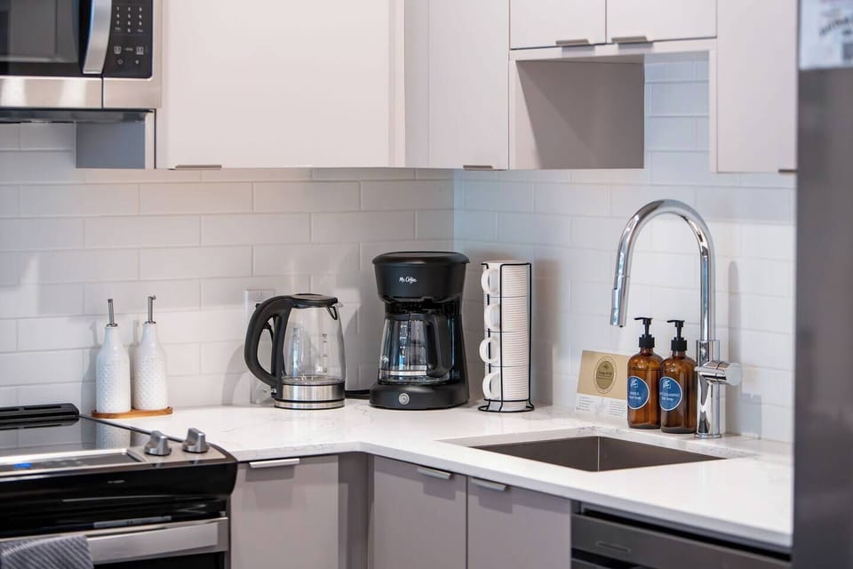 Kitchen stocked with coffee, tea, and essentials
