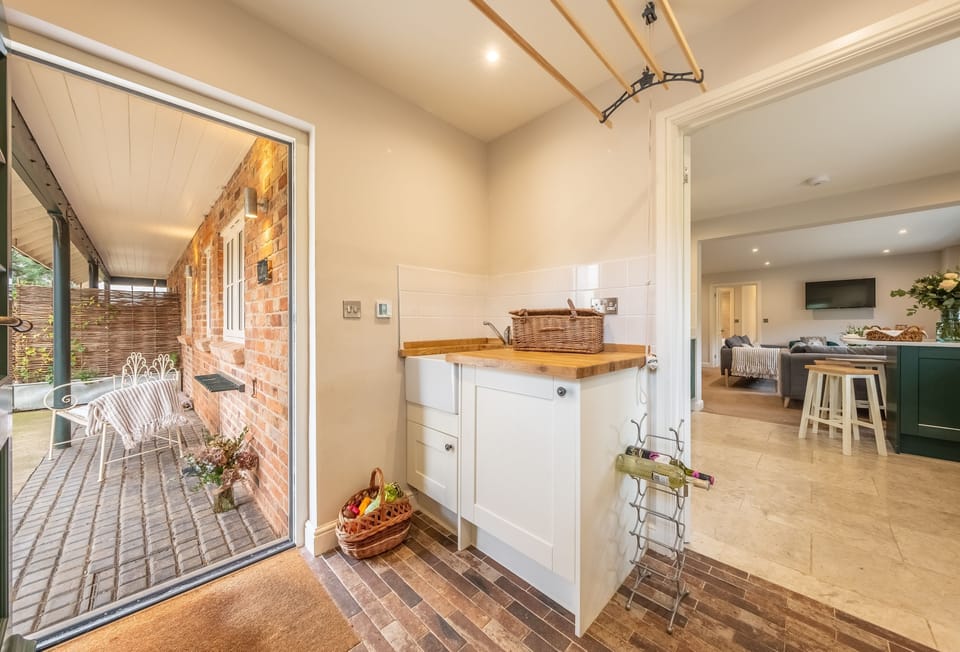 Ground floor: Tiled entrance utility lobby, the ideal spot for your dog's bed