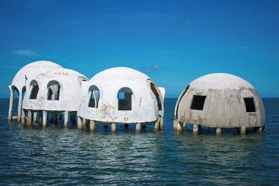 The famous 'dome' houses' now almost taken by the sea.   This area was on land 20 years ago. 