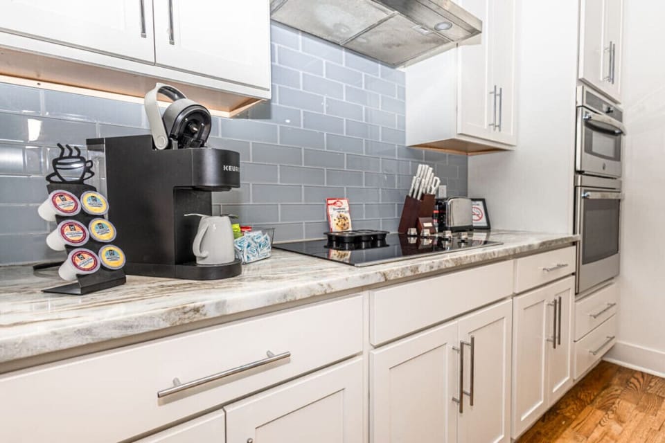 Kitchen: Modern amenities and sleek design, perfect for culinary adventures!
