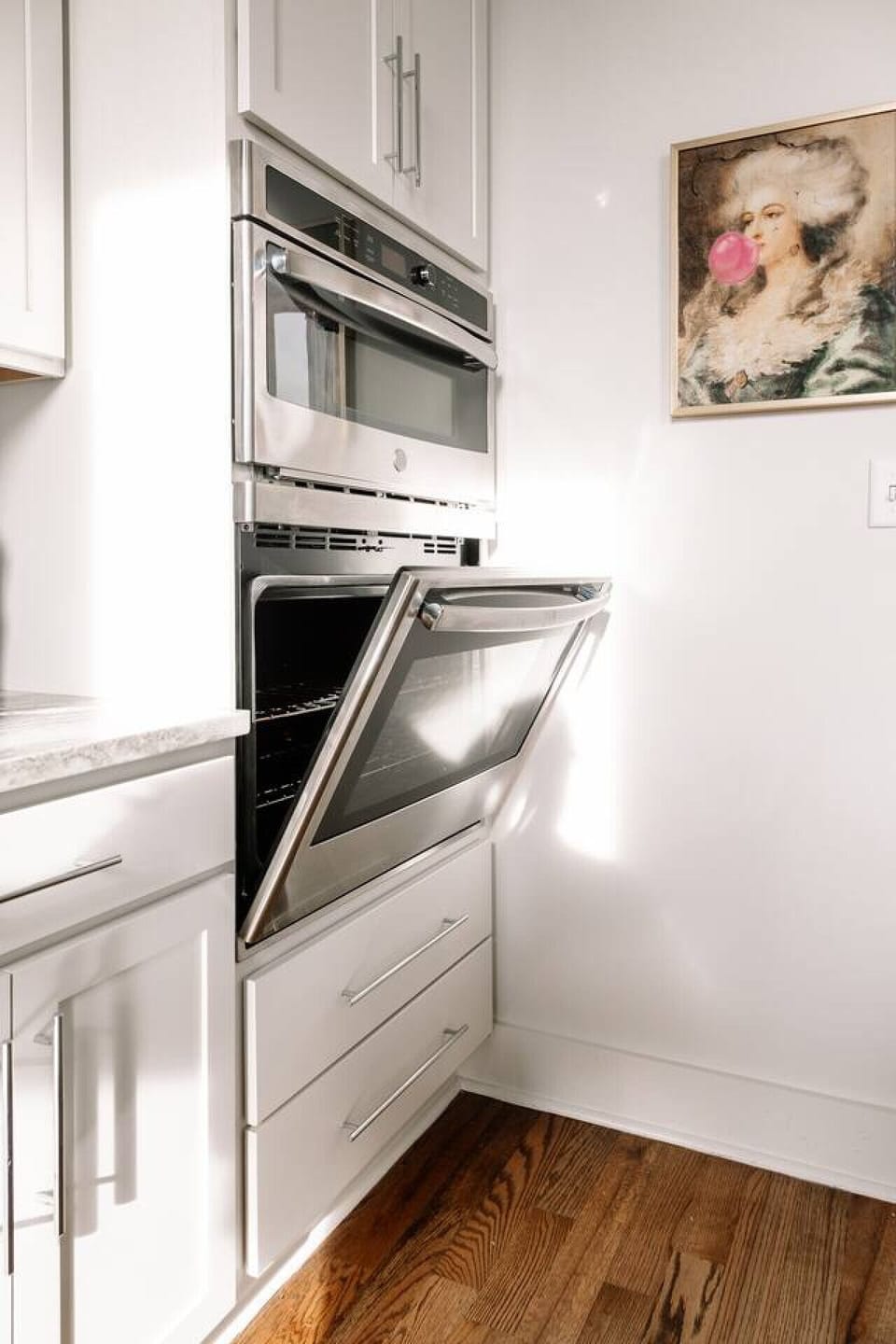 Kitchen: Sleek appliances await your culinary creations in this modern space!