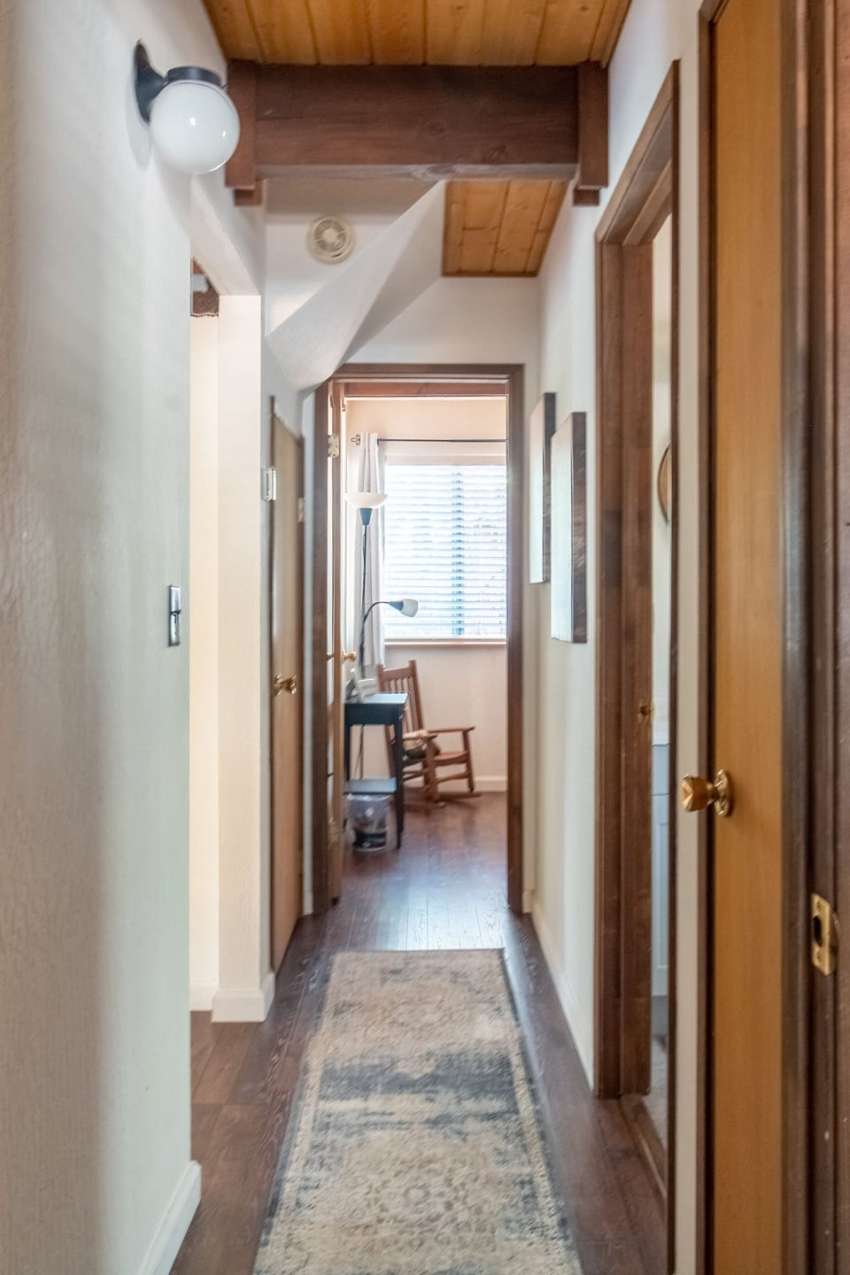 Hallway between downstairs rooms