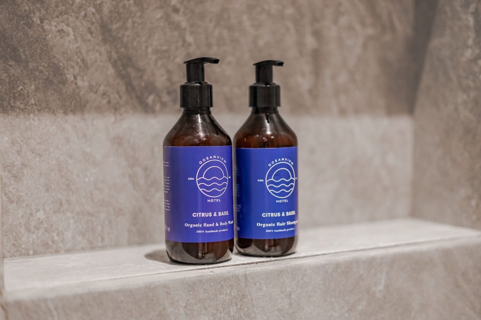 Shower, rainfall showerhead, eco-friendly toiletries, hair dryer