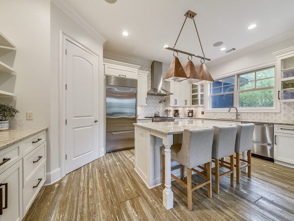Beautifully Renovated Kitchen with Large Island at 7 Dogwood