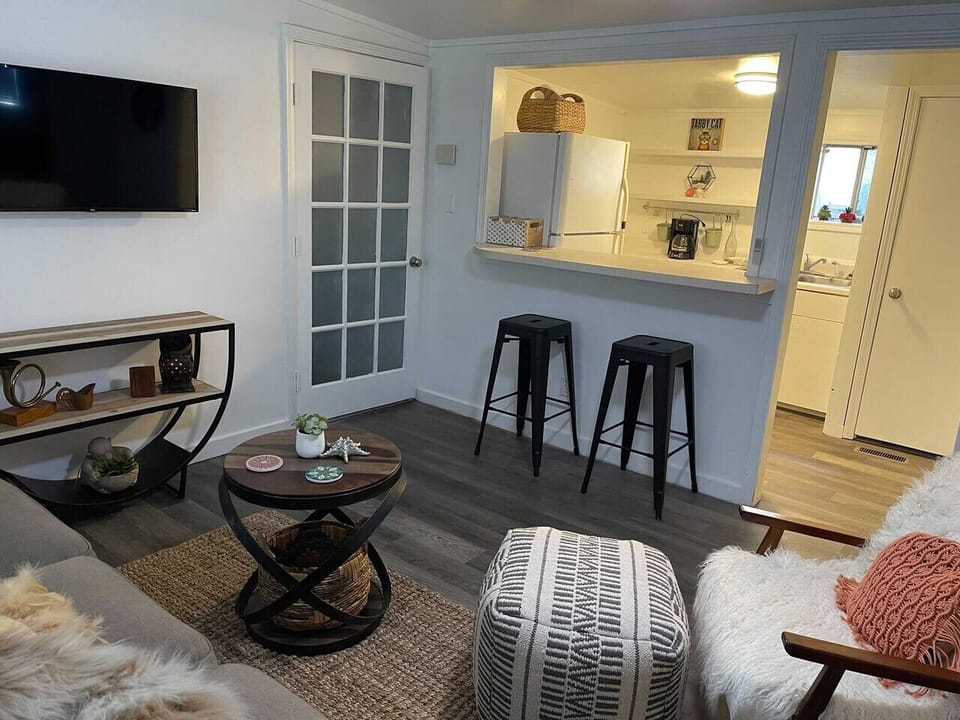 Open living space with a breakfast bar ready for morning coffee.