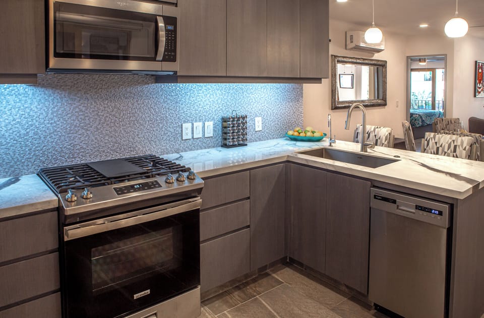 Drawers stocked with every utensil you didn’t know you needed! Spice rack too!