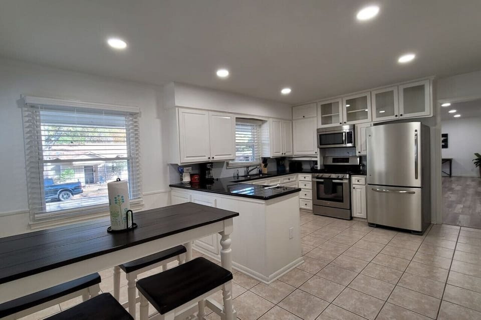 The kitchen is spacious and includes modern stainless steel appliances and all necessary cooking items. It also comes with starter portions of condiments for your convenience.