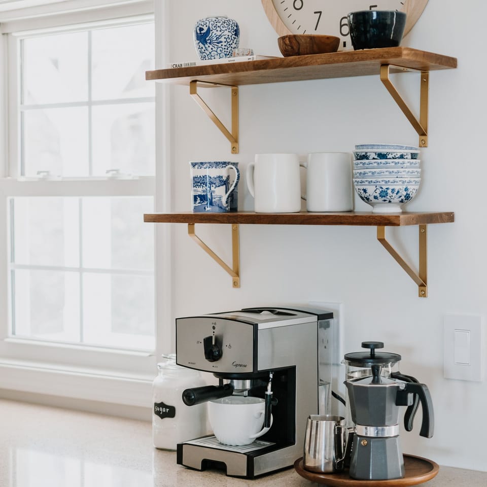 A fully stocked coffee bar is waiting.