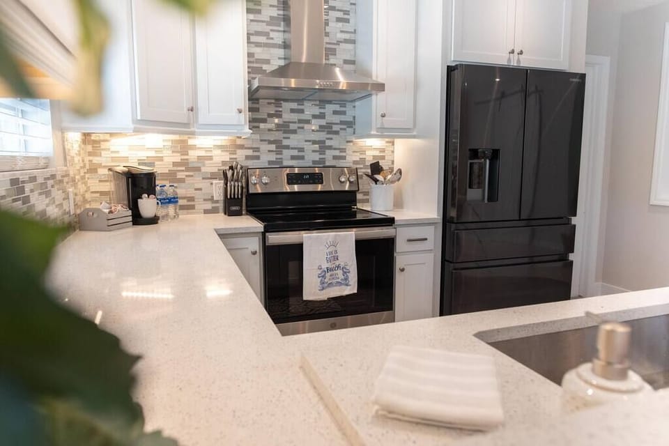 Beautifully remodeled kitchen fully stocked with all the essentials needed to make a delicious meal morning, noon or night.