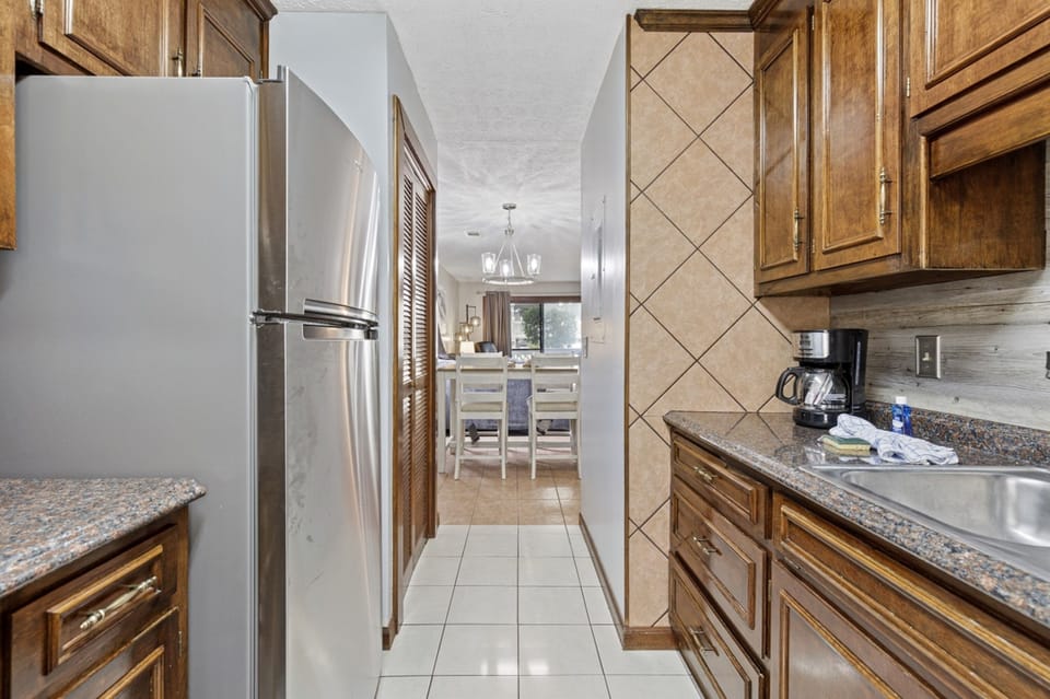 Signature Condo, 2 Bedrooms, Balcony | Private kitchen | Fridge, microwave, oven, stovetop