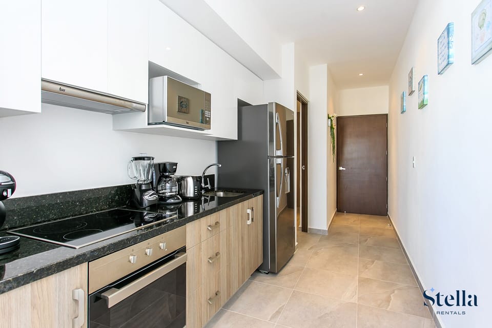 Honeymoon Apartment, 1 King Bed, Balcony | Private kitchen | Full-size fridge, microwave, oven, stovetop