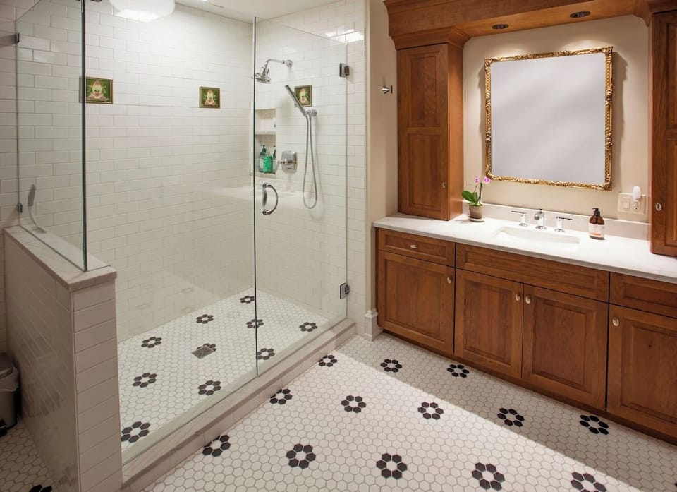 Bright master bathroom featuring clean finishes & a polished look.
