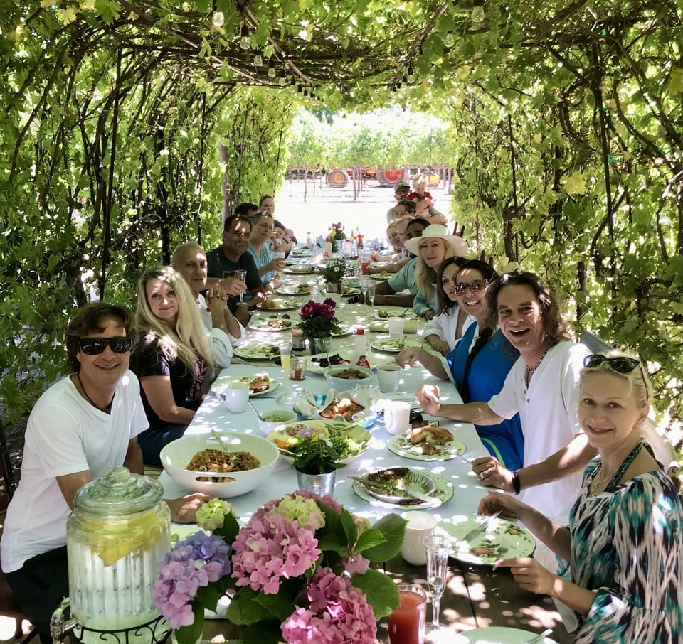 Dine under the grapevines with friends and family