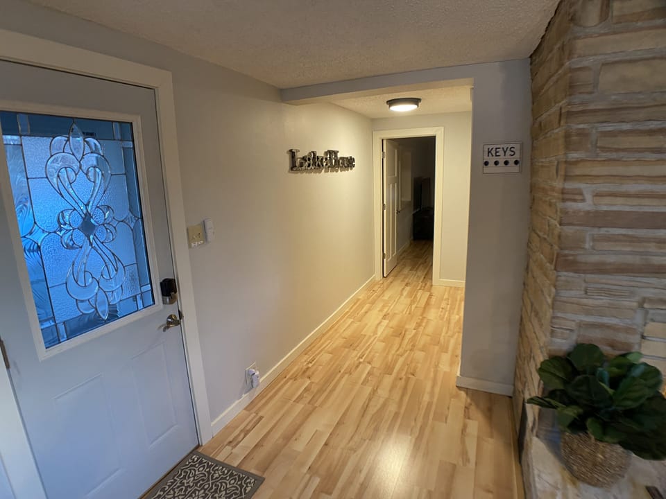 Front door which is adjacent to the primary bedroom.