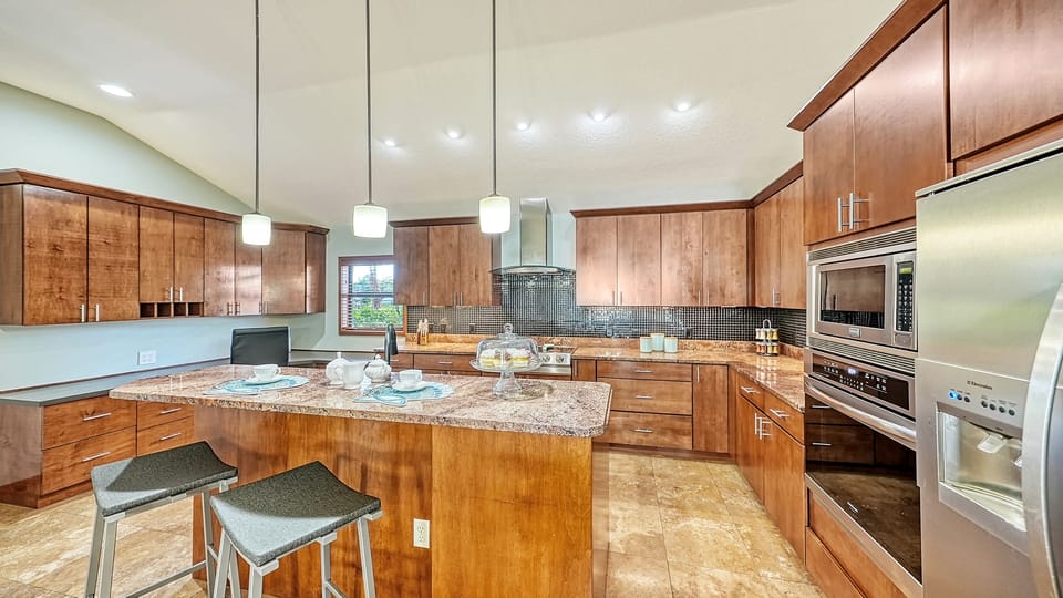 Kitchen island with breakfast bar.