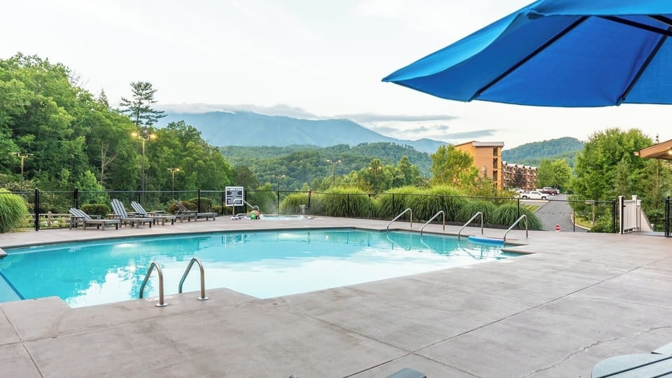 Outdoor Pool • Mountain Views & Lounge Deck