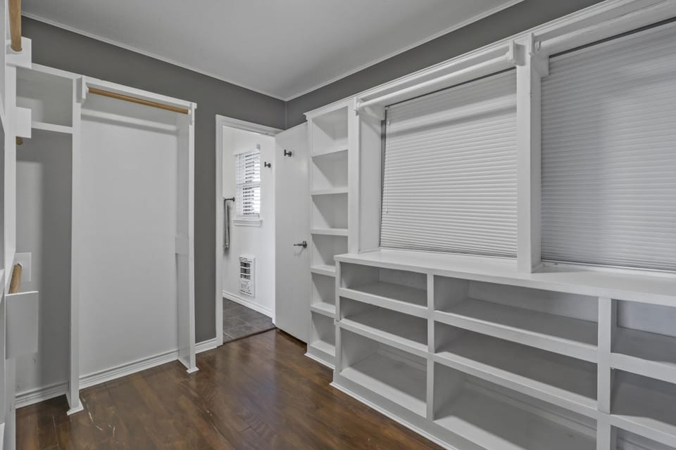 Full size washer dryer stocked with laundry essentials and pantry storage