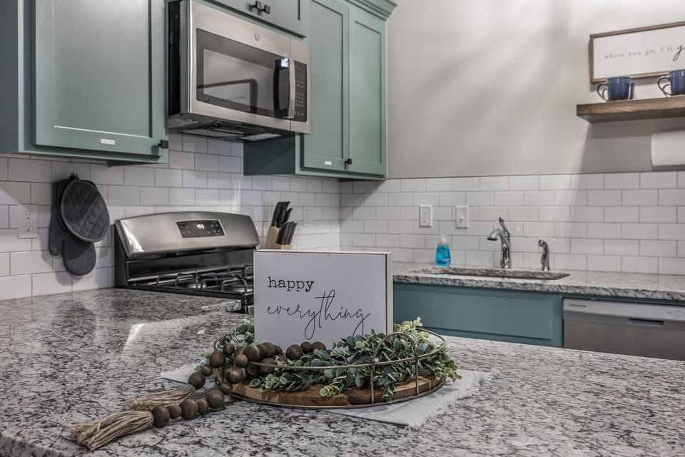 Deluxe Apartment | Private kitchen | Full-size fridge, microwave, oven, dishwasher