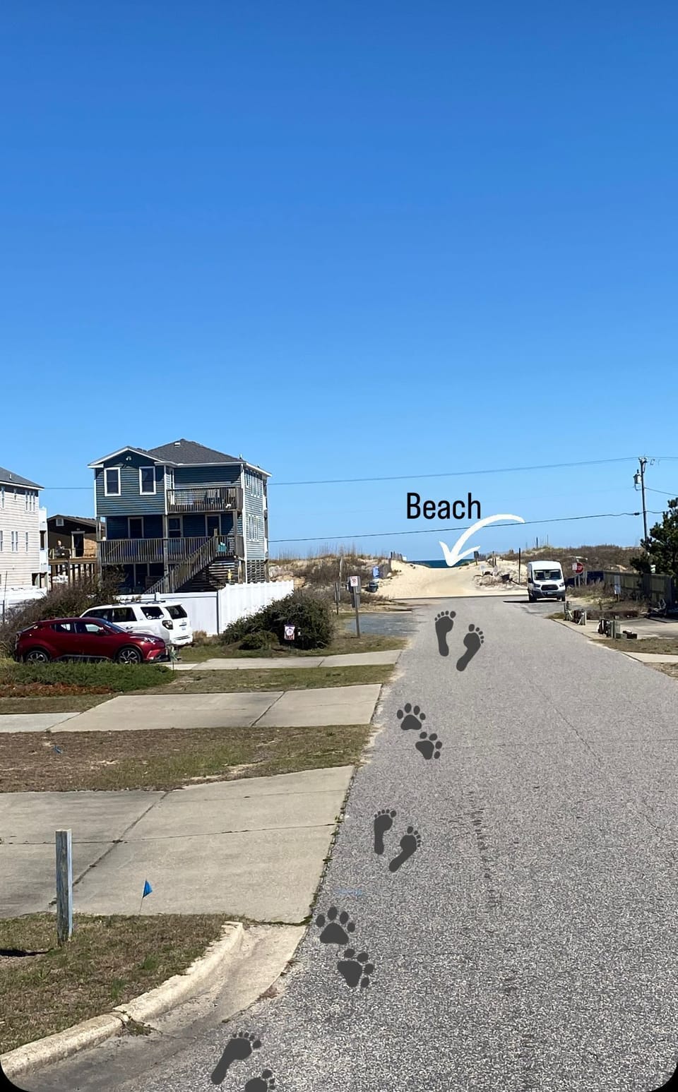 Literally STEPS to the beach access on a safe residential road.