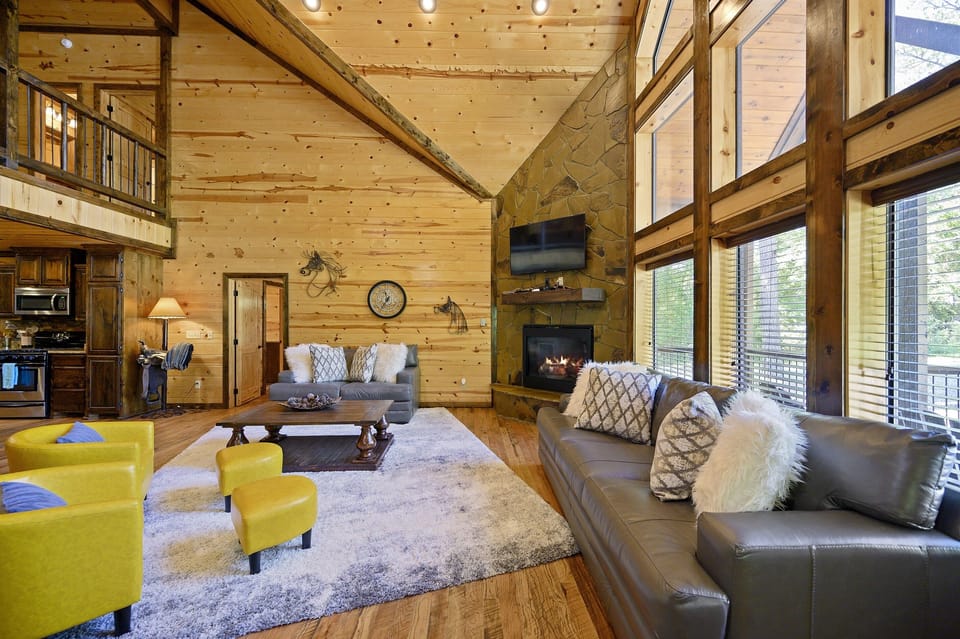 Open floor plan with high ceilings in the living area