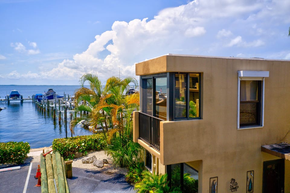 Exterior of the Property right by the bay and marina
