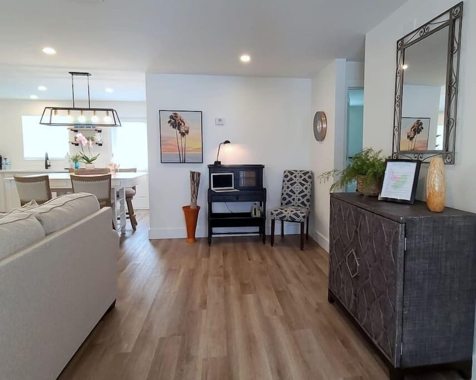 Welcoming entryway with desk space for when you must work. 