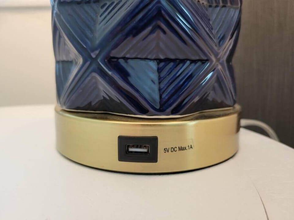  USB connection on lamp bases in Queen guest room. 
