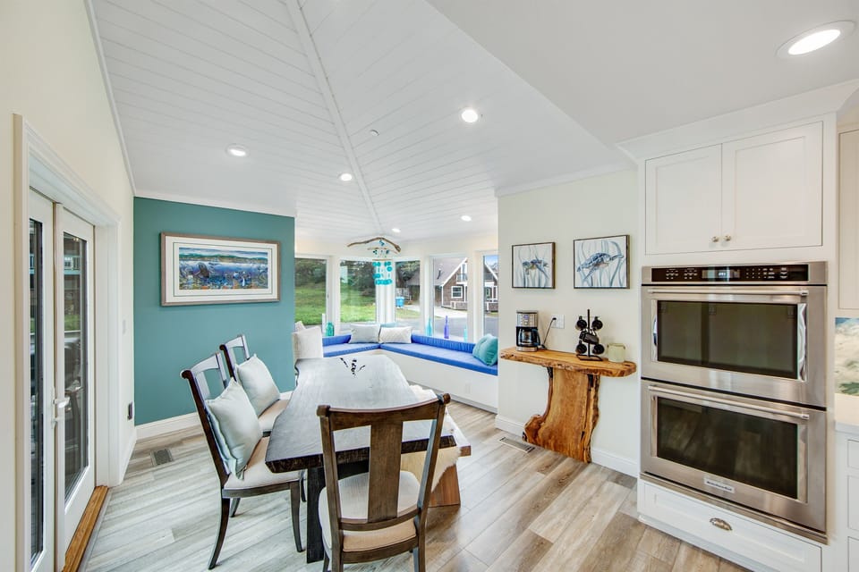 Curl up on the bench window seat with your favorite book while enjoying the ocean view