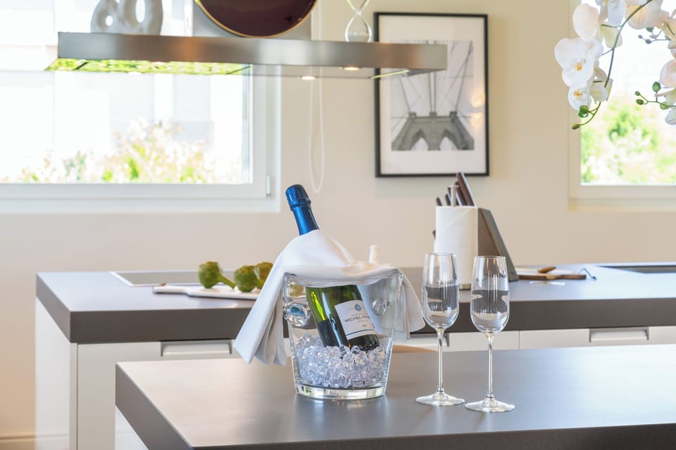 Premium bedding, down comforters, in-room safe, desk