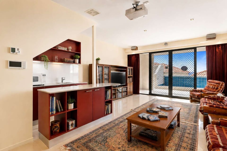Settle in for a movie night in the comfortable second living area with TV, DVD books and board games.