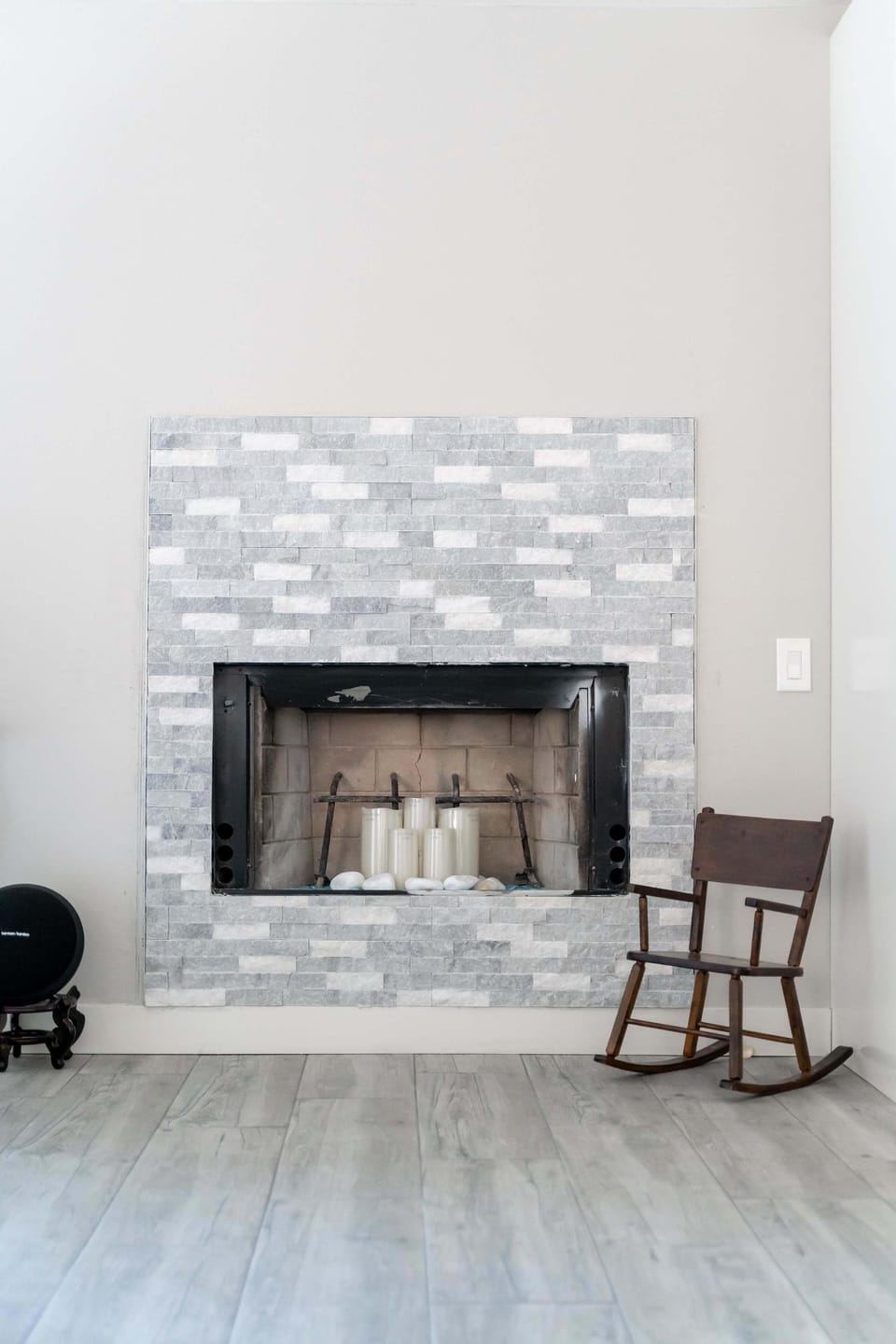 A unique tile fireplace off the side of the kitchen.
