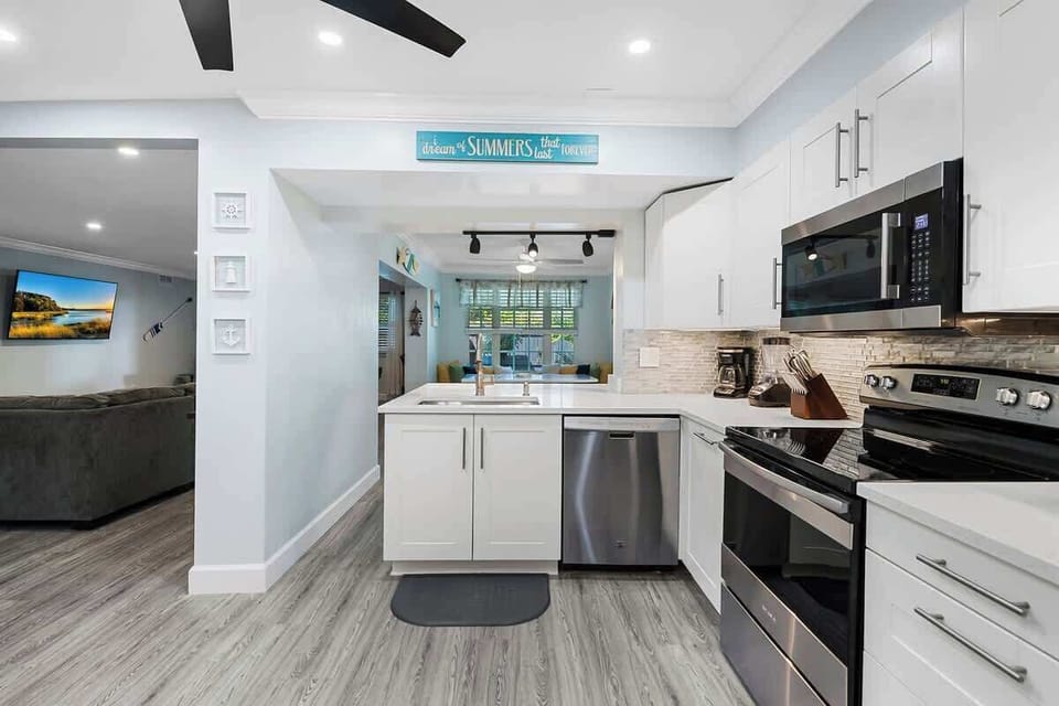fully appointed kitchen with stainless steal appliances