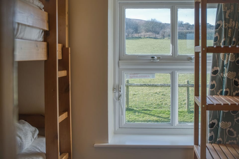 4 bedrooms, premium bedding, iron/ironing board, free WiFi
