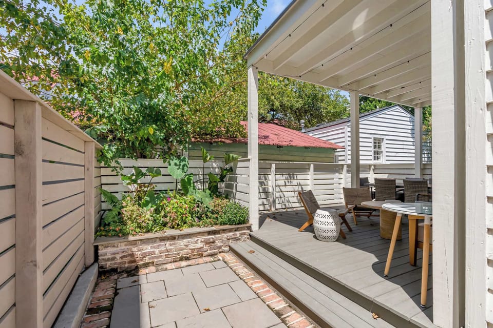 Shared outdoor patio area with downstairs unit. 