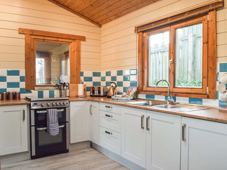 Kitchen | Marros Hill Log Cabin, Marros, near Pendine