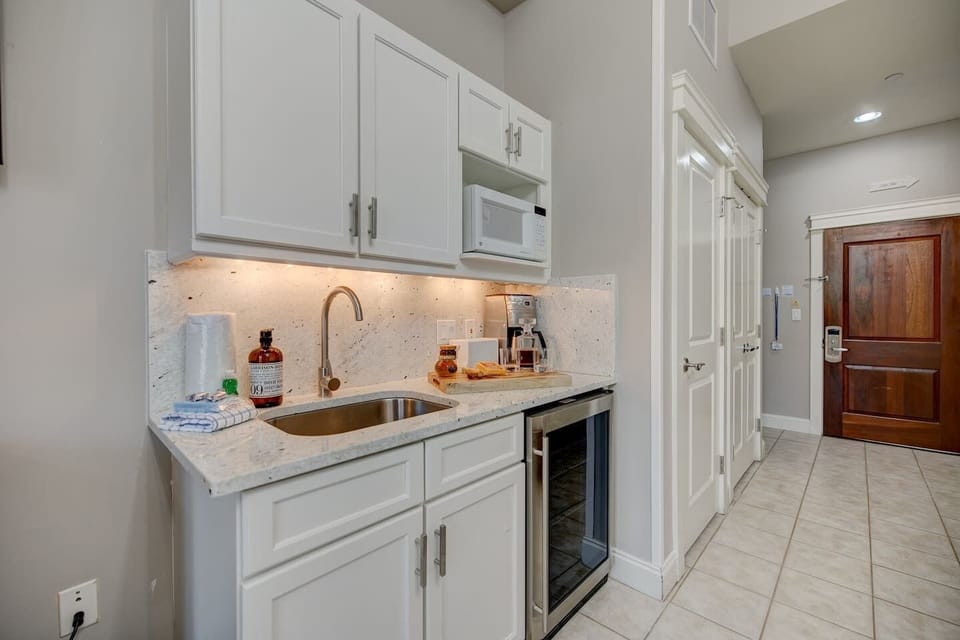 Our kitchenette has a beverage fridge, both traditional and Keurig coffee makers, microwave, and sink.