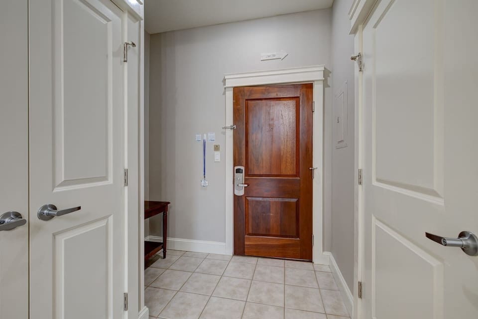 As you enter the condo your amenity lanyard is hanging next to the door. The bathroom is to your immediate left and the hallway closet is big enough to hang your clothes.